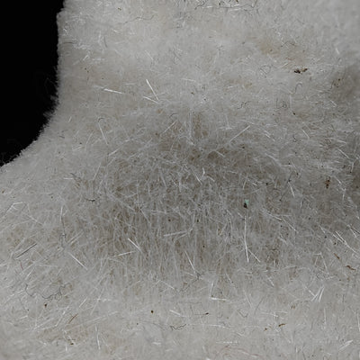Detail of fine mesolite crystal fibers with delicate curling needle tips
