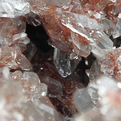 Celestine crystal with sharp termination amid orange-tinted matrix, Turkmenistan