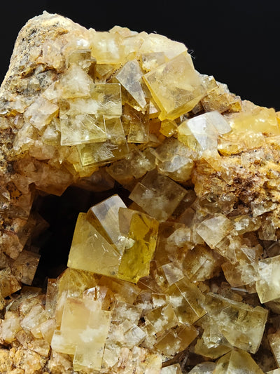 Cluster of yellow fluorite cubes on matrix, Hilton Mine, Cumbria, England