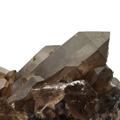 Side view of elongated smoky quartz crystal, Mont Blanc Massif, Italy