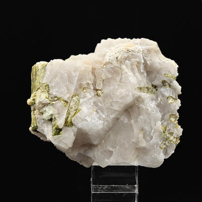 Quartz matrix with lepidolite after tourmaline pseudomorph crystals, side view