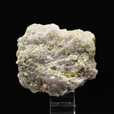 Quartz matrix studded with small green lepidolite after tourmaline crystals, Brazil