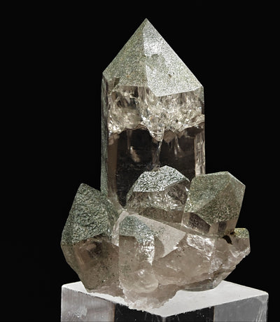 Side angle of smoky quartz cluster showing chlorite-coated crystal faces, Switzerland