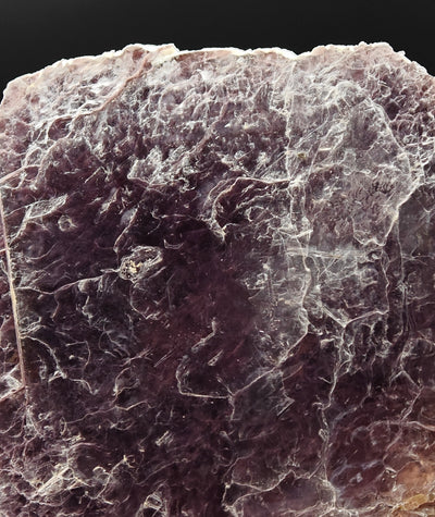 Close-up detail of lepidolite mica sheets and texture, Minas Gerais, Brazil