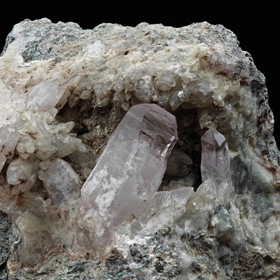 Detail of pink amethyst crystal cluster with quartz terminations, Capurru Mine