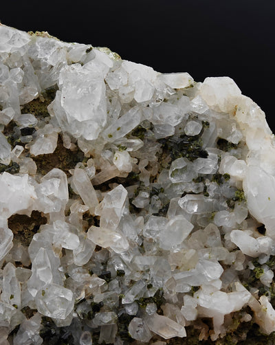 Side view of Quartz crystals and dark green Epidote crystals on matrix, Gambatesa Mine
