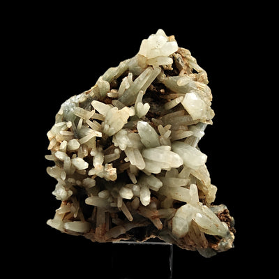 Prase quartz and hedenbergite specimen displayed on stand, Elba Island, Italy