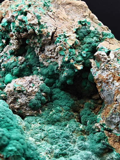 Detail of dense malachite mammillary crystallization forming cavity pattern, Sardinia, Italy