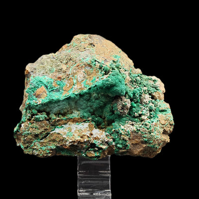 Side view of malachite specimen on matrix with scattered green crystallization, Sardinia, Italy