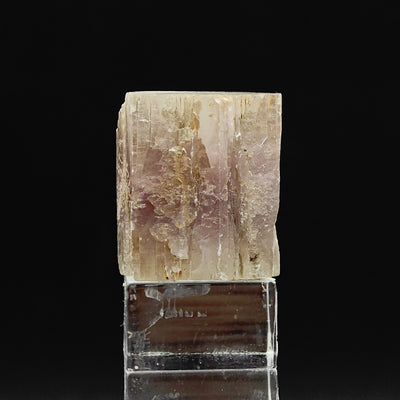 Front view of striated aragonite crystal showing pale violet and lilac zoning, Cuenca, Spain