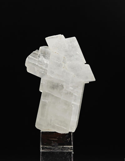 Angled view of water-clear twinned calcite crystal from Parma Province, Italy