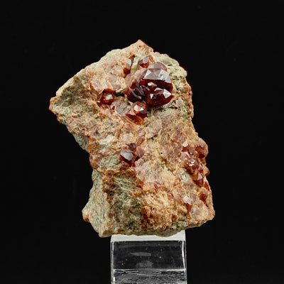 Side view of grossular garnet specimen on matrix, Sasso Bianco, Vogogna