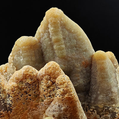 Detail of ridged smithsonite crystal surface showing translucent faces, San Giovanni Mine