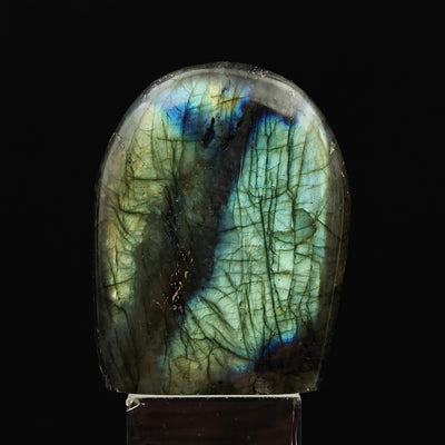 Close-up of labradorite specimen with green and gold labradorescence, Madagascar