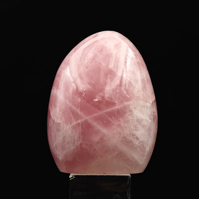 Rose Quartz tumbled stone showing intense pink coloration and star pattern