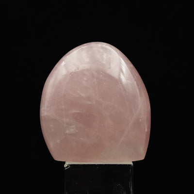 Rose Quartz tumbled stone with domed top and soft pink surface