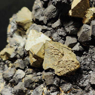 Detail of layered Pyrite octahedron with Magnetite crystals