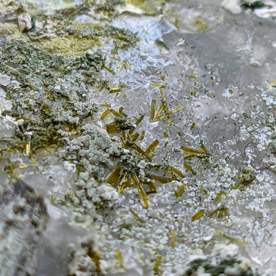 Detail of radiating Epidote needles on smoky Quartz matrix from Grisons, Switzerland